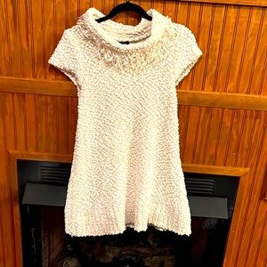 A nubby Winter white long sweater/cap sleeves. Perfect condition new